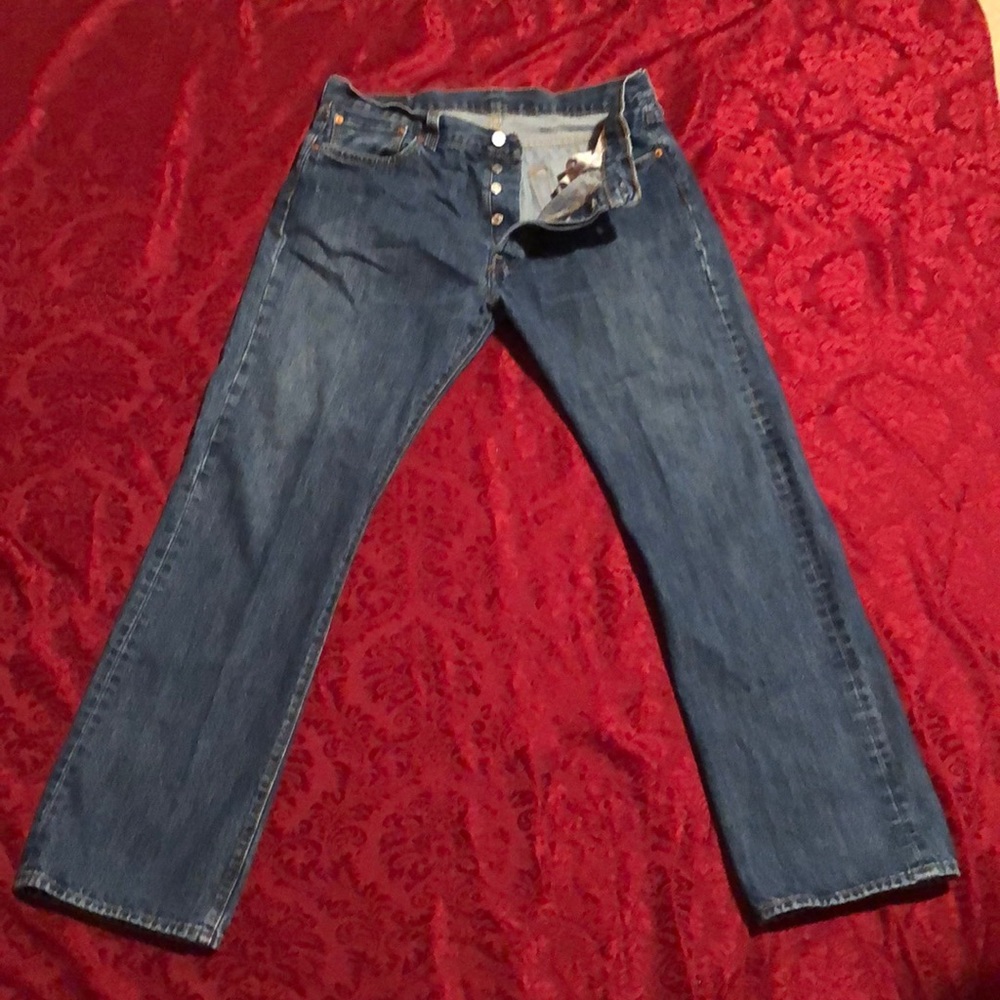 Vintage Levi’s 501 men’s jeans waist 35” length 32”. No stains, hems intact